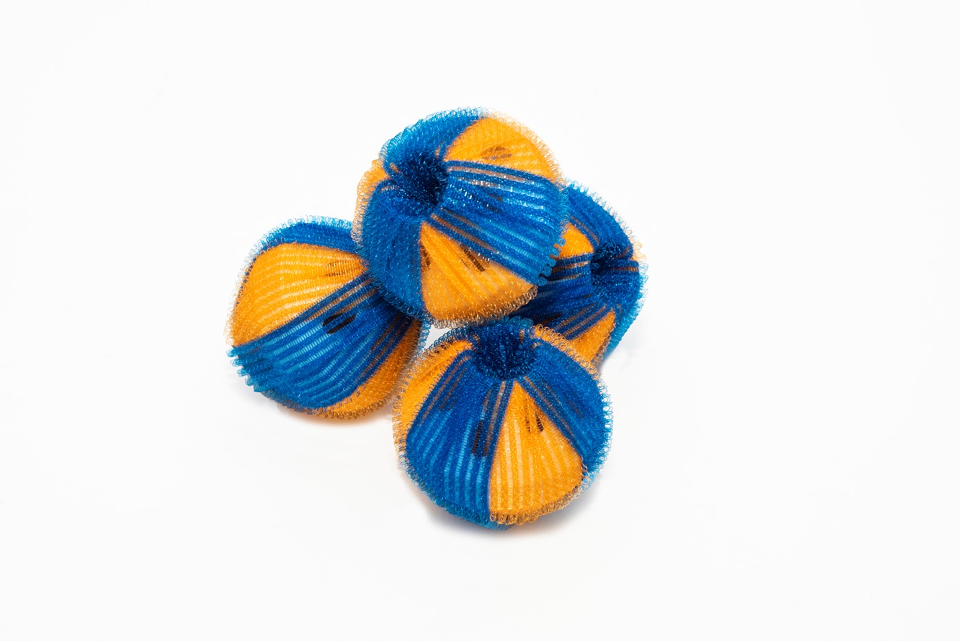 orange and blue anti lint balls with fuzzy texture